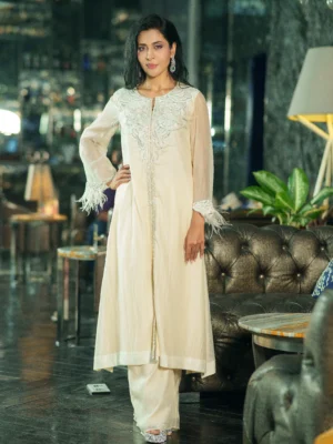 White kameez with feather and pearl